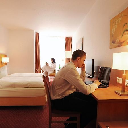 Cityclass Hotel Atrium Budget Leverkusen Oda fotoğraf
